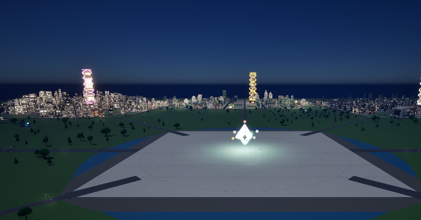 The Classic City skyline at night from the central plaza